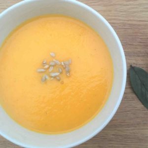 Carrot and apple soup with sunflower seeds