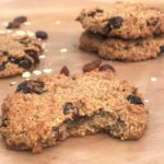 Healthy oat and raisin cookies on wooden board