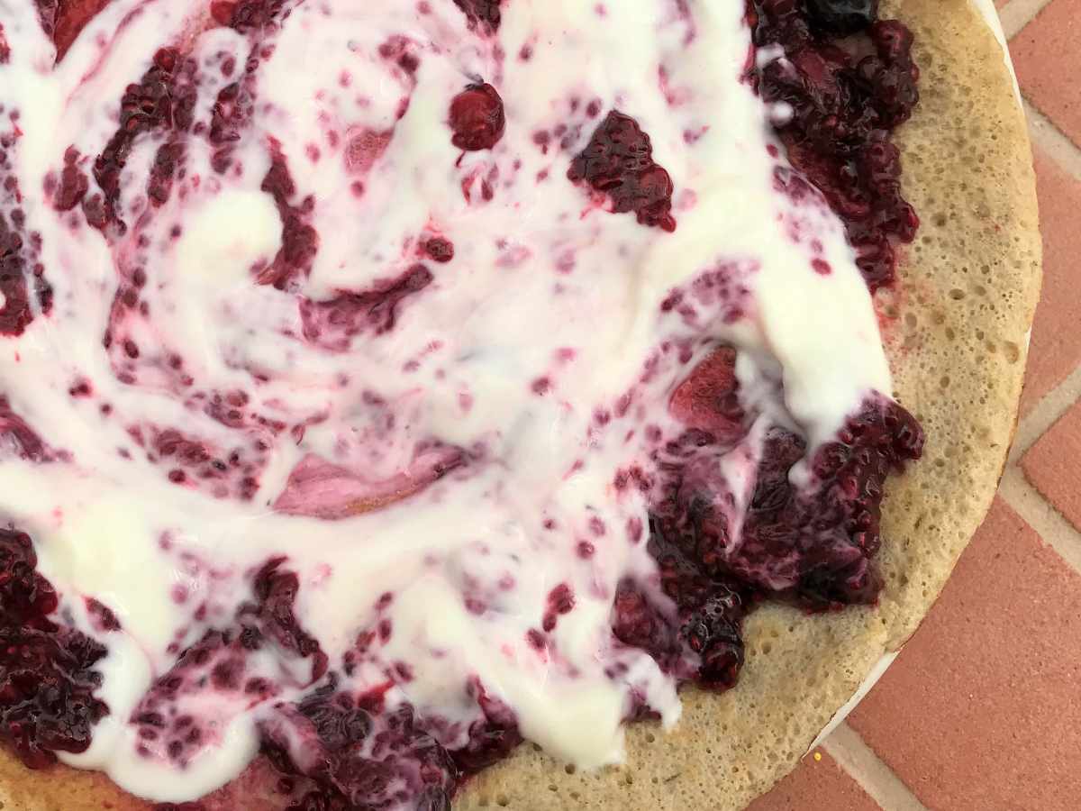Low sugar berry jam and yogurt on oat pancake