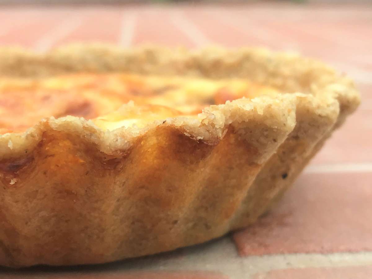 Side view of quiche showing healthy pastry