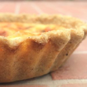 Side view of quiche showing healthy pastry