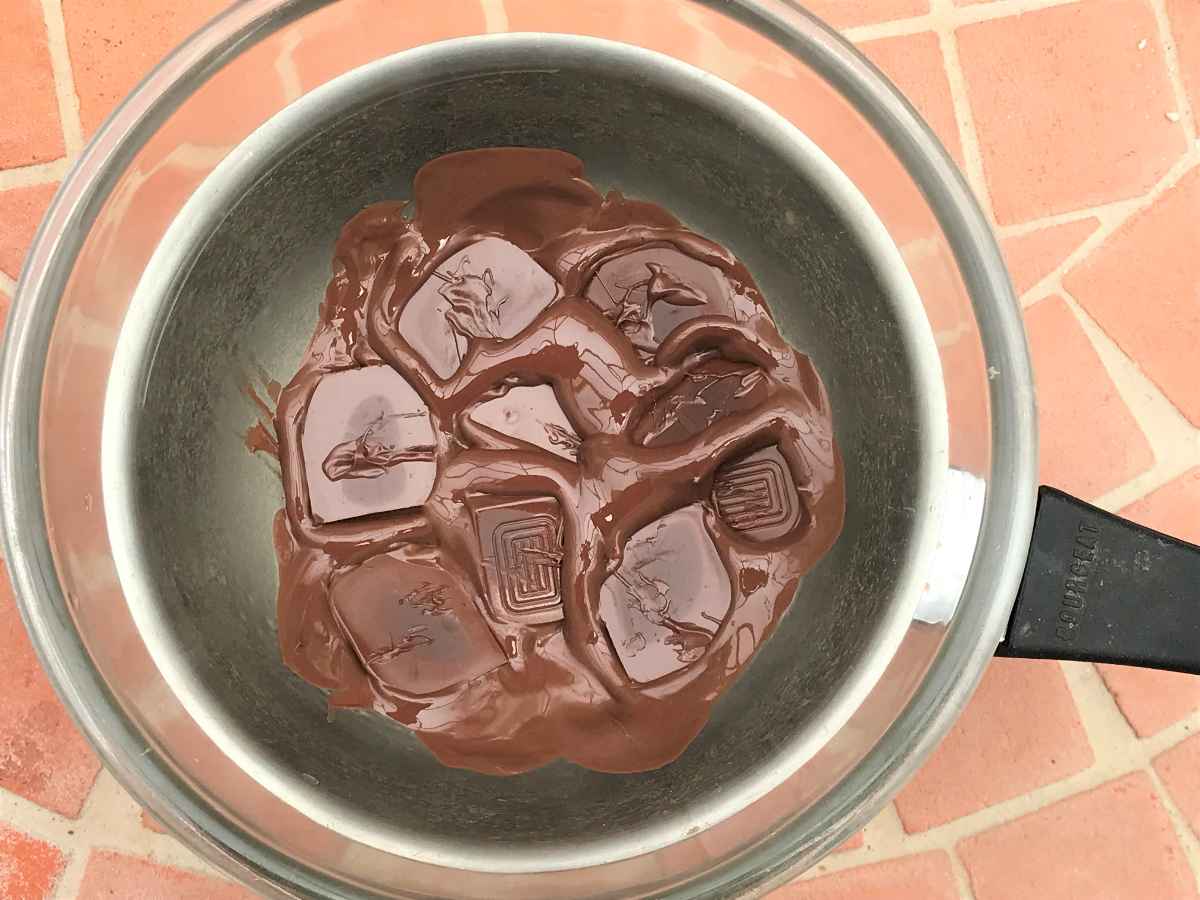 Melting dark chocolate in a bowl.