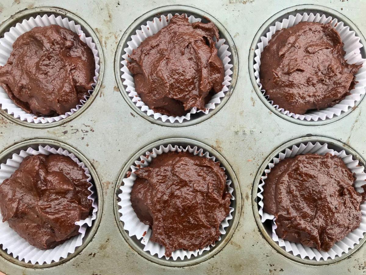 Gluten free chocolate muffins mixture in tin
