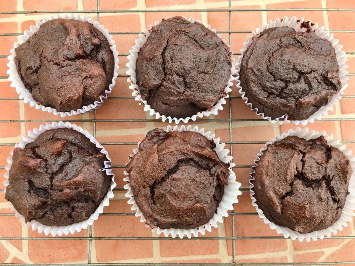 Chocolate prune muffins on cooling rack