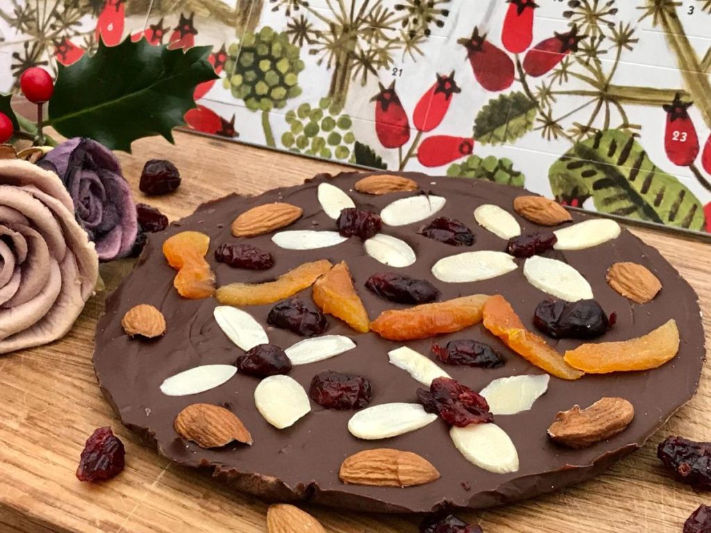 Christmas chocolate slab decorated with dried fruit and nuts