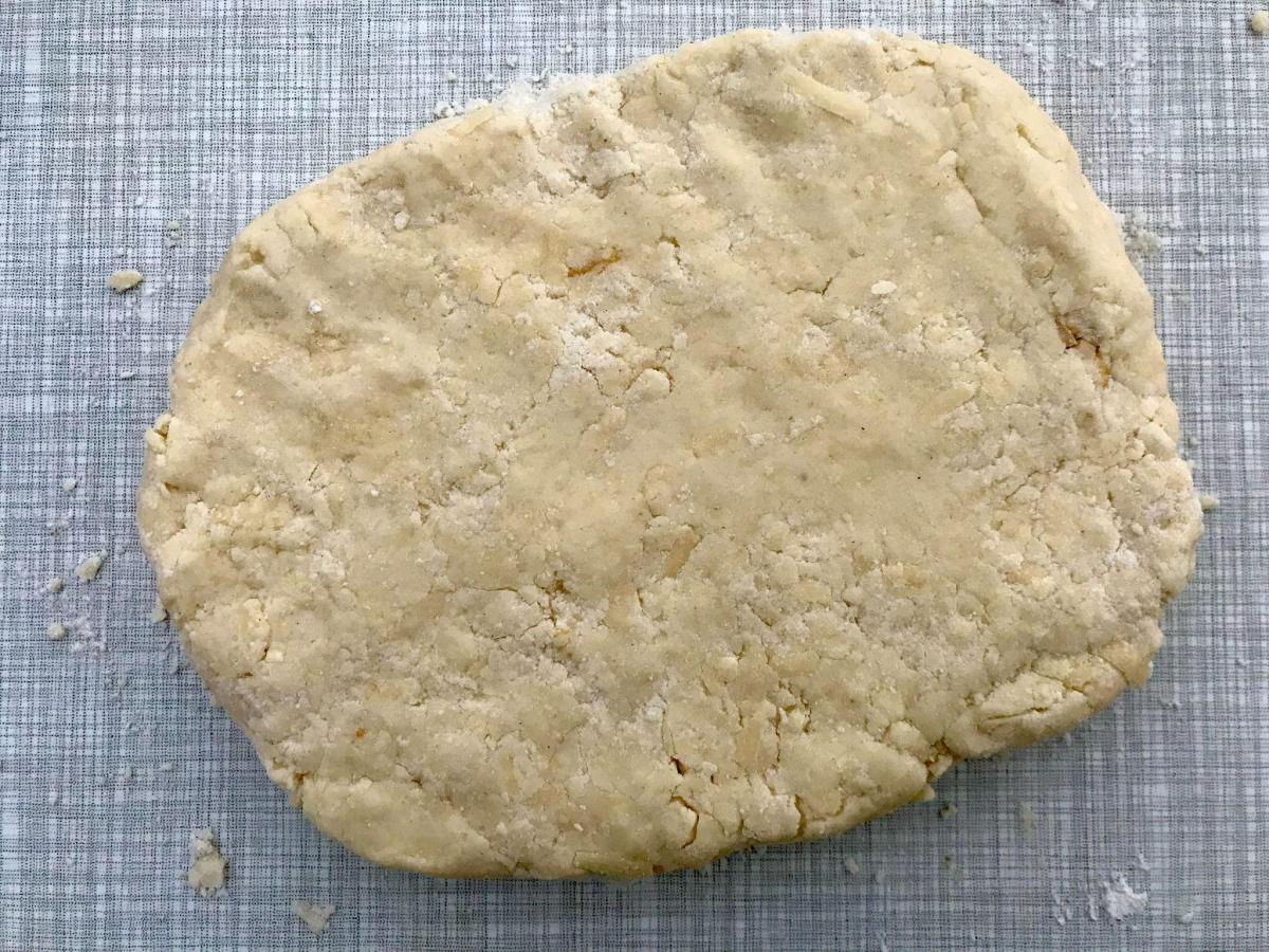 Gluten free cheese scone dough on board. 