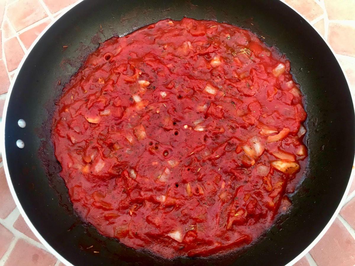 Healthy tomato sauce in frying pan