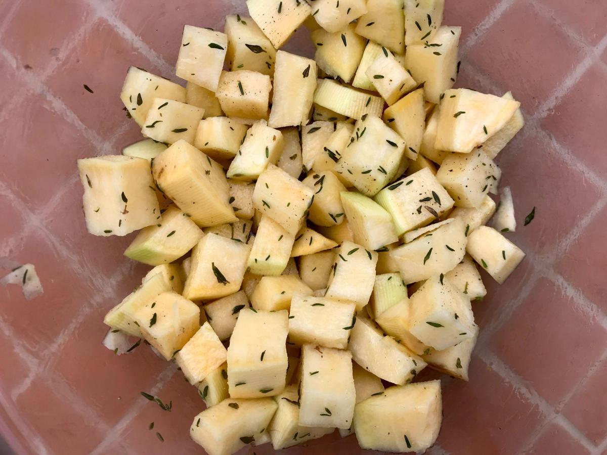 Diced swede tossed with herbs and olive oil