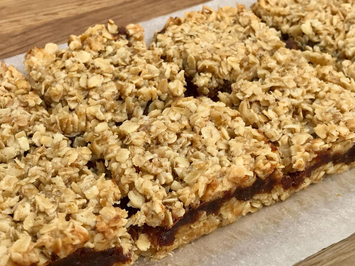 Date and oat squares on baking paper
