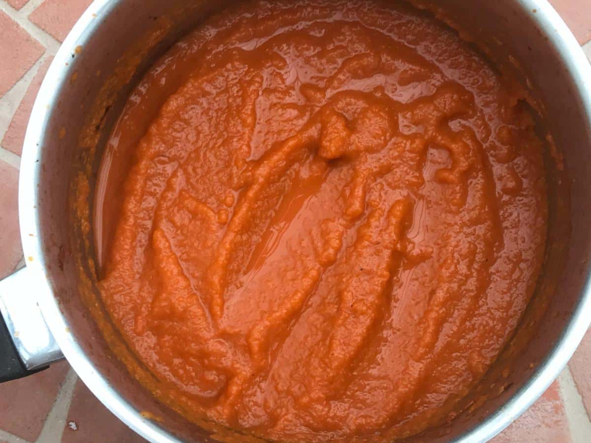 Pureed tomato sauce in pan