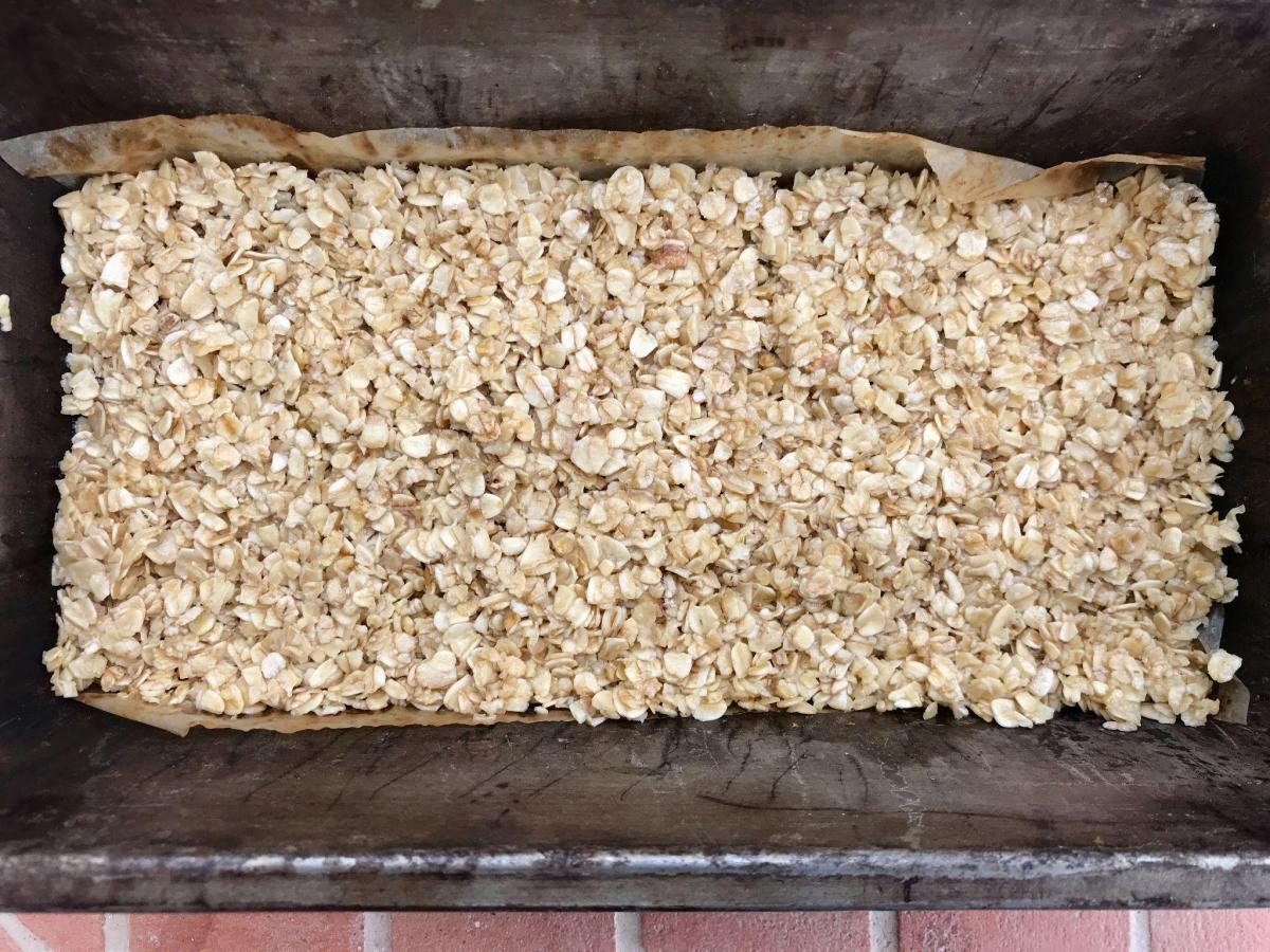 Apricot oat slice in tin ready to bake.