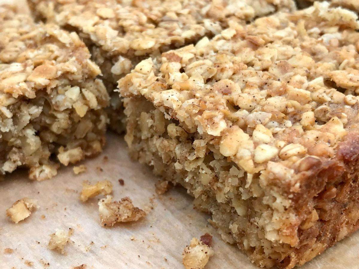 Sliced flapjack with crumbs.