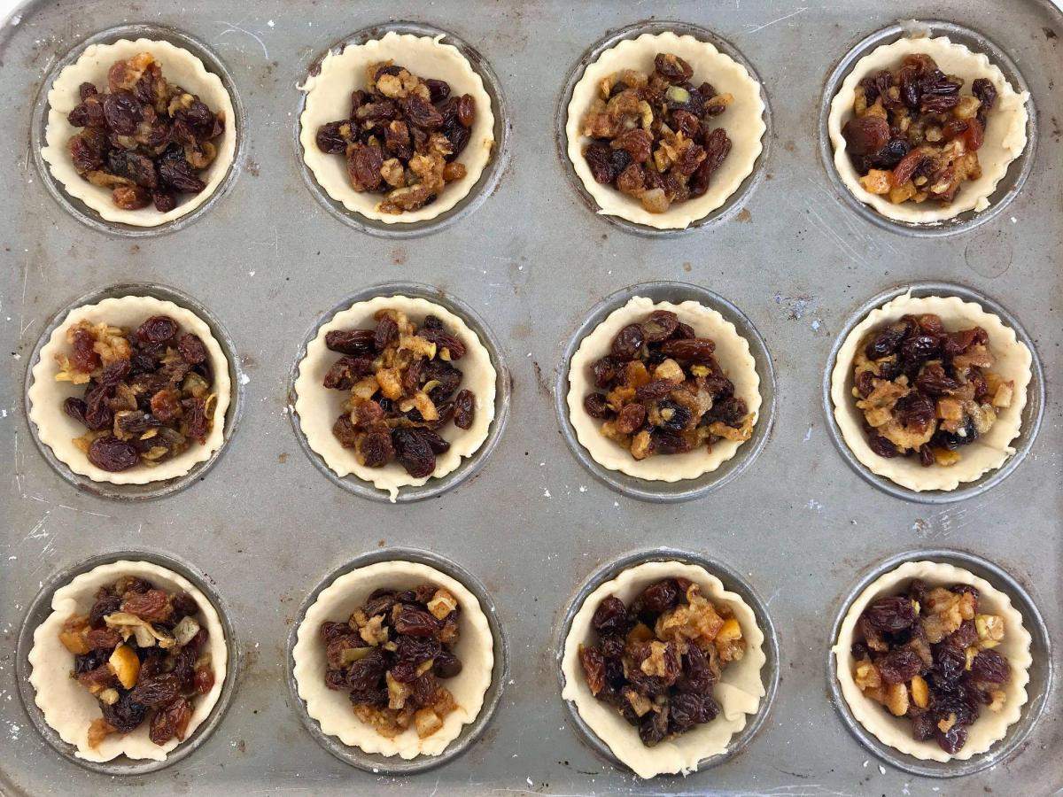 Mincemeat in pastry in baking tin.