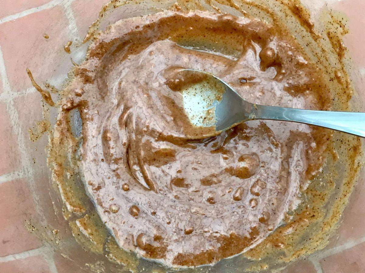 Mixing almond butter and honey.
