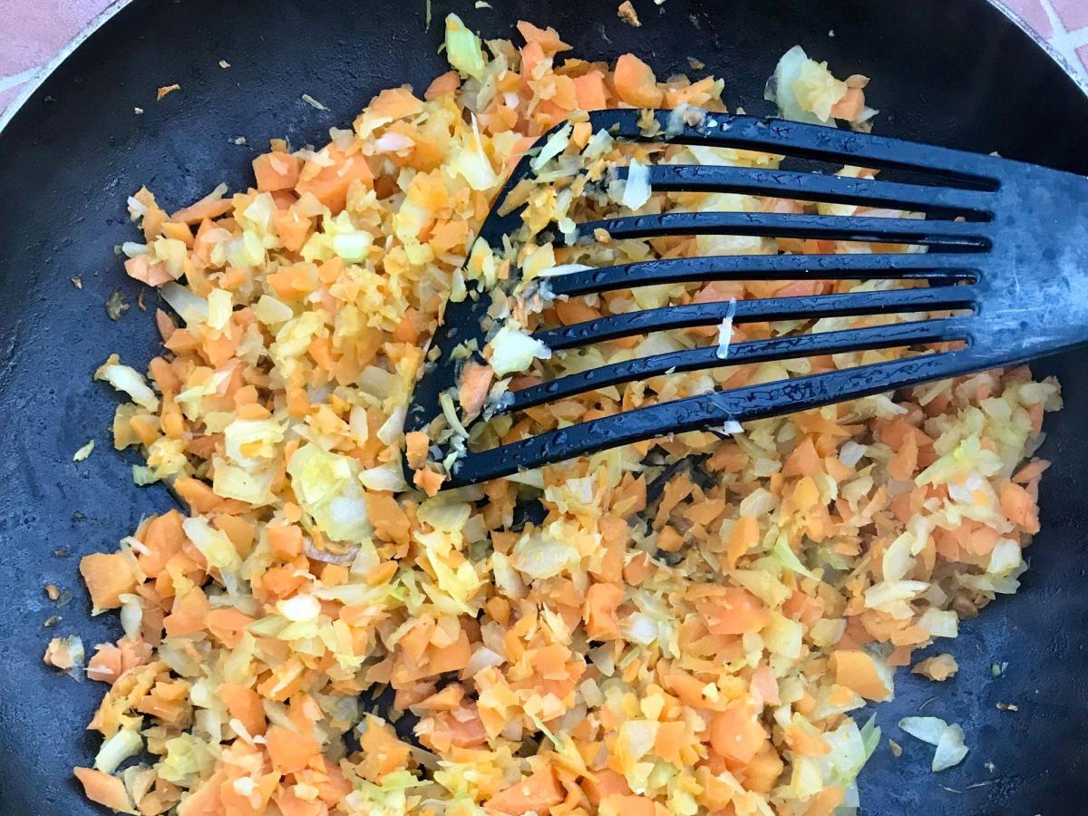 Saute carrots, celery and onion in pan.