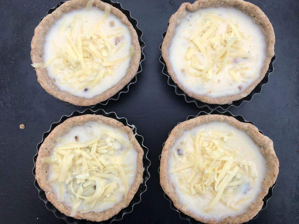 Uncooked cheese and onion quiche.