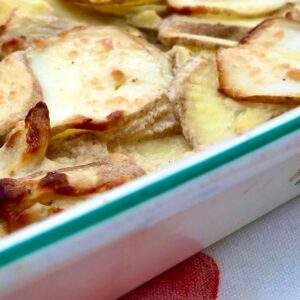 Dish of low fat dauphinoise potatoes.