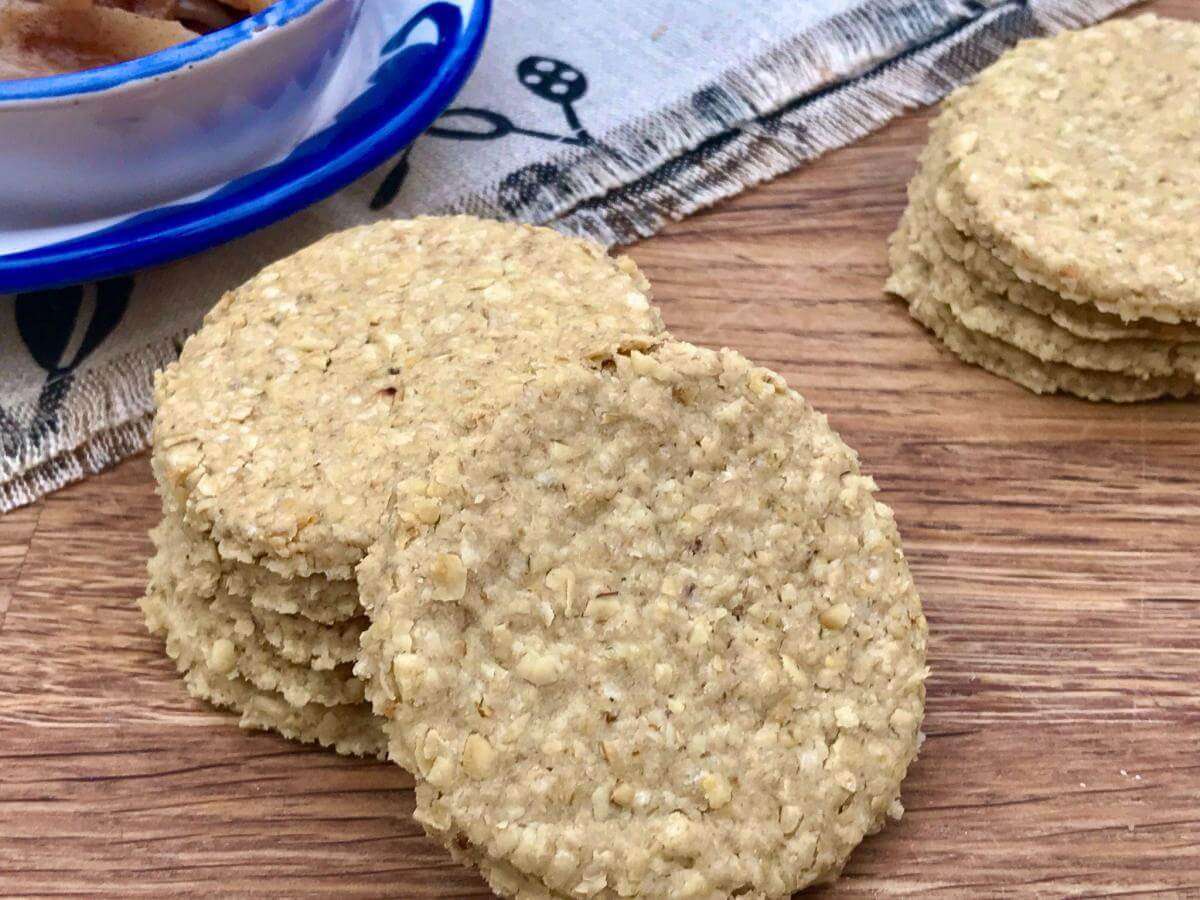 Gluten free oatcakes on wooden board.