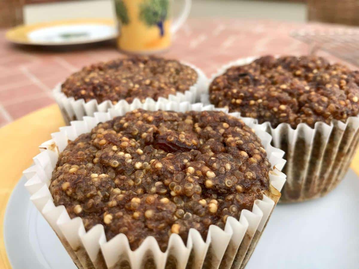 Quinoa muffin on yellow plate.