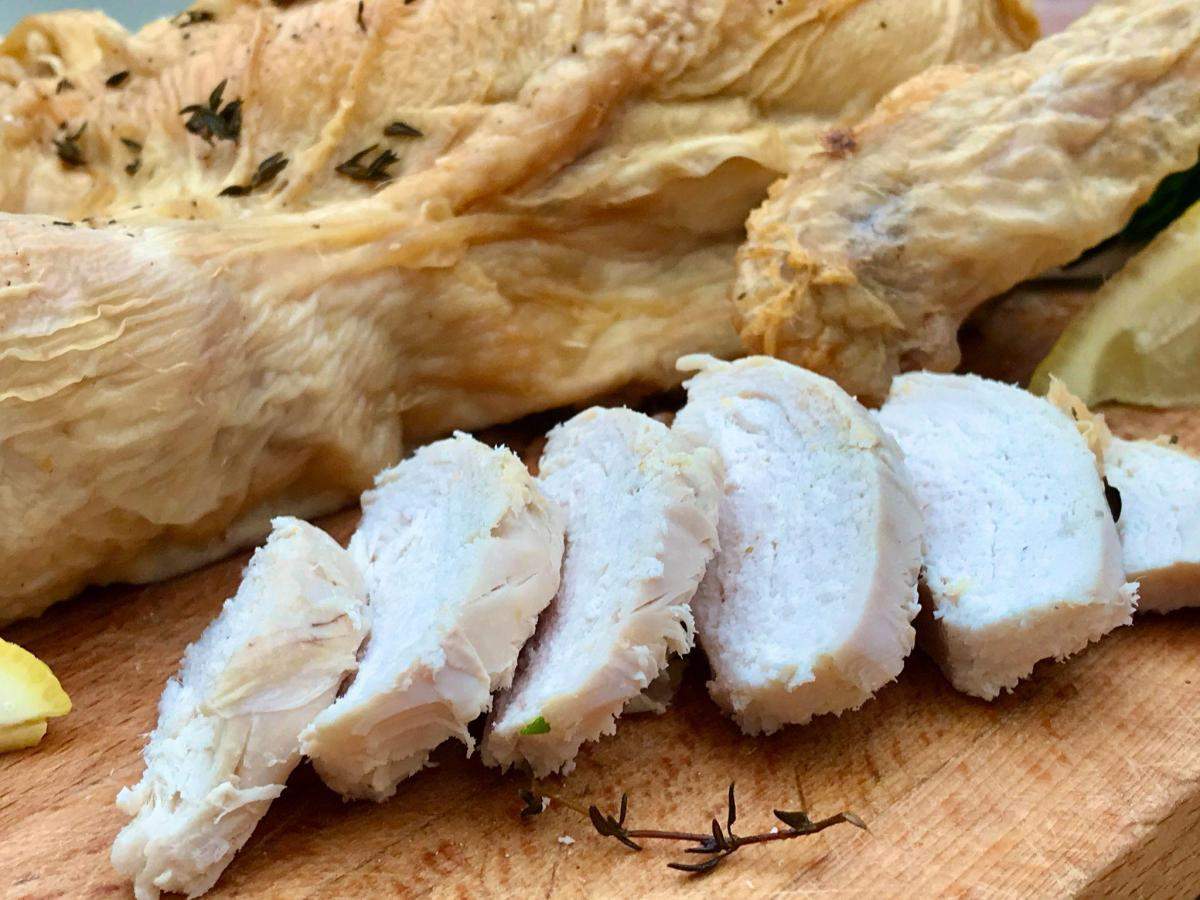 Roast chicken with slices of meat.