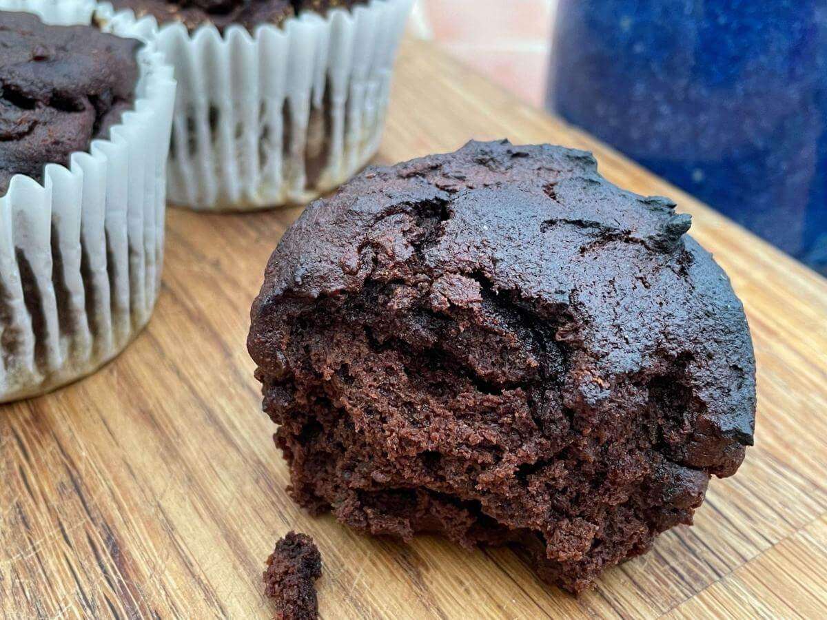 Coconut flour chocolate muffin with crumbs.