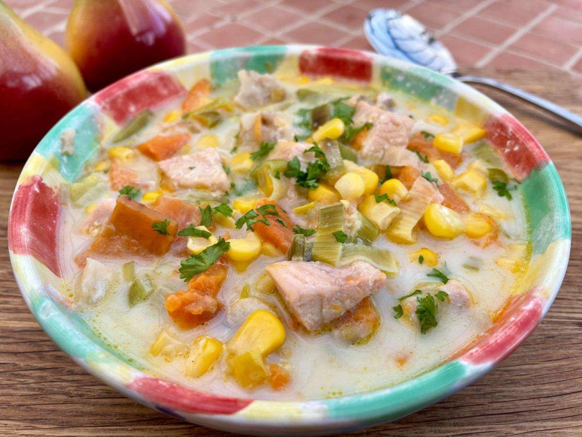 Easy fish chowder in coloured bowl.