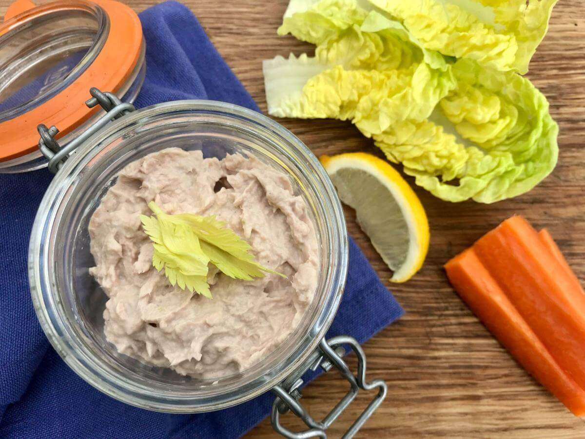 Tuna pate with cream cheese in clip top jar with salad.