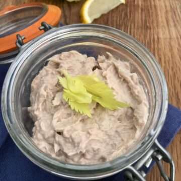 Tuna pate with cream cheese in glass jar.