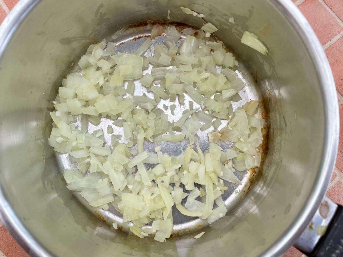Onion and garlic in pan.