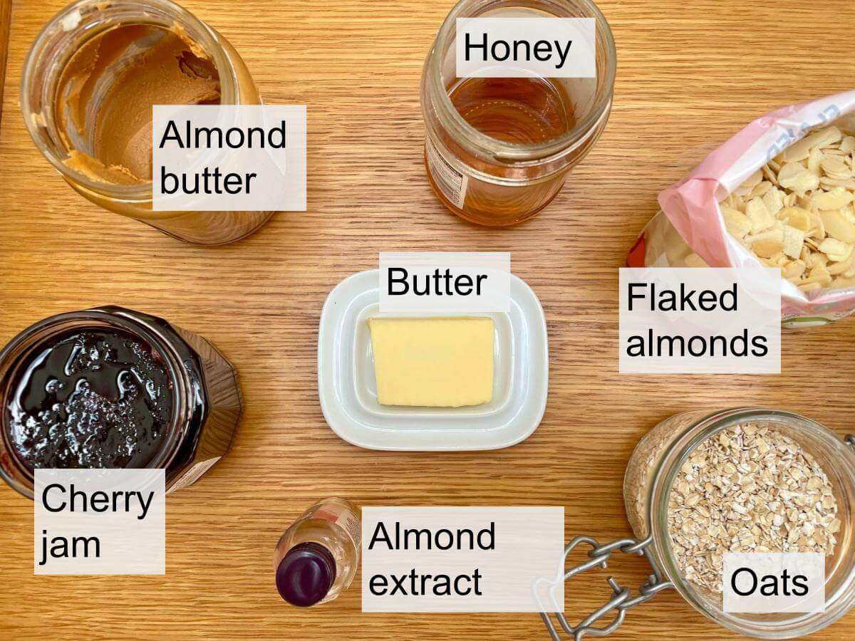 Almond butter, honey, butter, almond extract, oats, flaked almonds, cherry jam.
