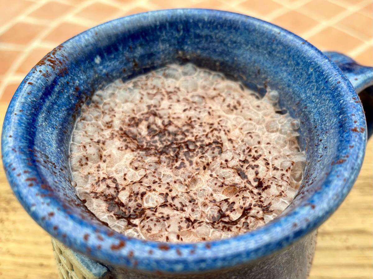 Dairy free hot chocolate in blue mug.