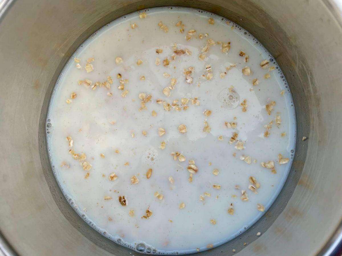 Milk and oats in pan.