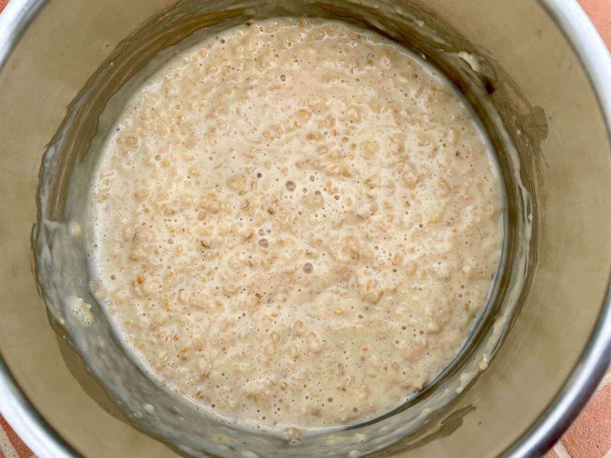Oatmeal with peanut butter in pan.