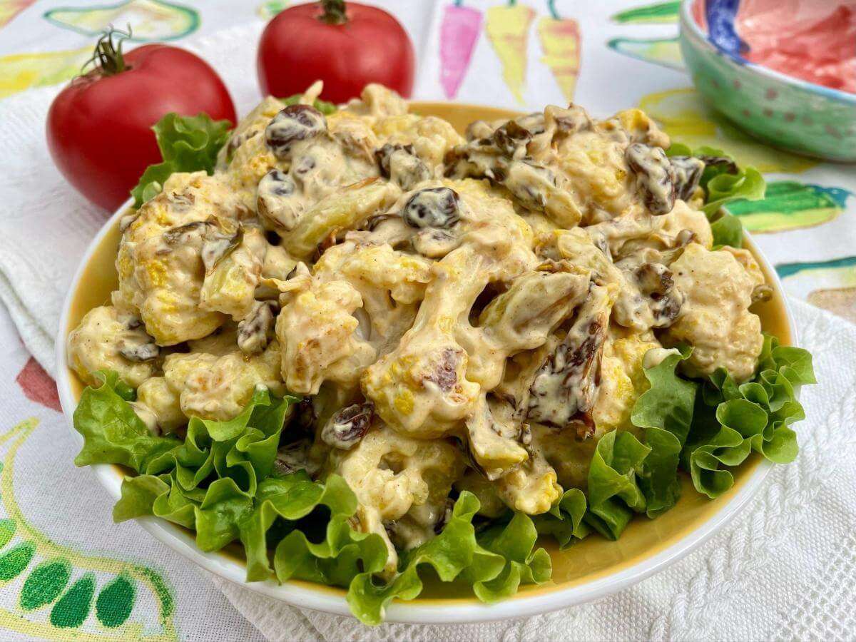 Coronation chicken on bed of lettuce.