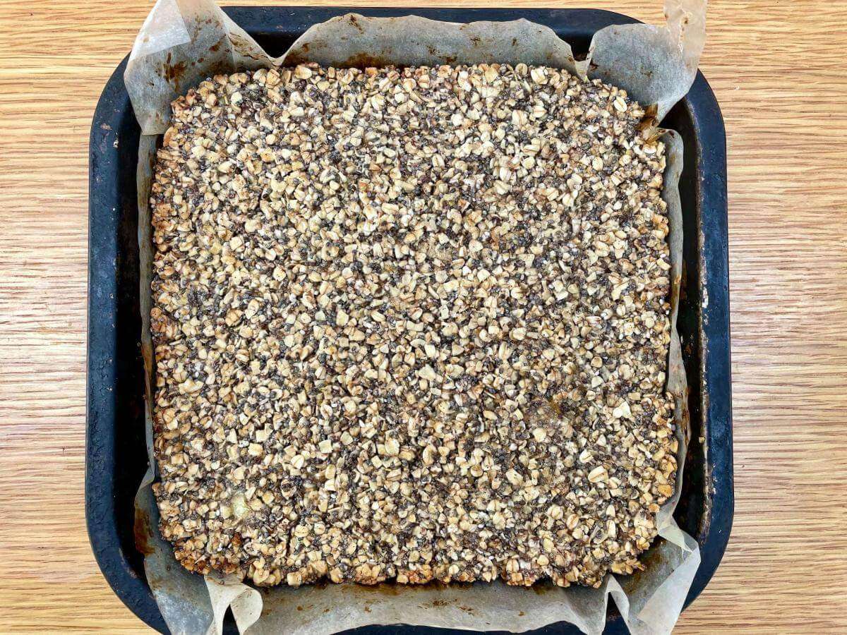 Baked chia flapjack in tray.