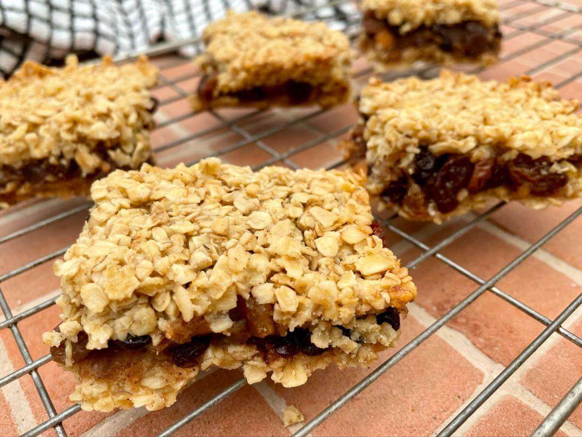 Mincemeat crumble bars on wire rack.