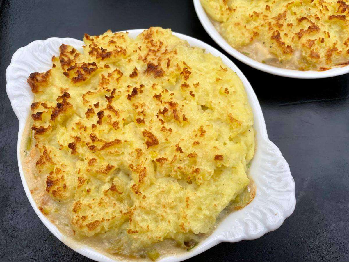 Grilled potato topping on fish pie.