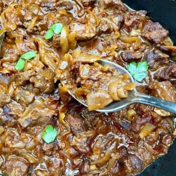 Slow cooker braised steak and onions.