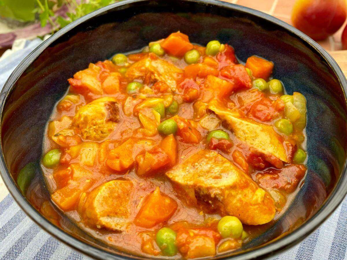 Slow cooker sausage curry with vegetables.