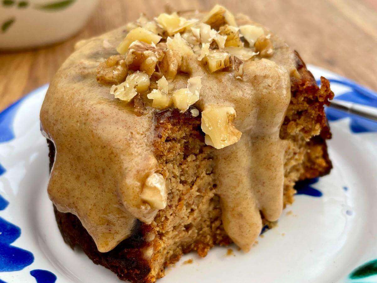 Healthy sticky toffee pudding with sauce dripping.