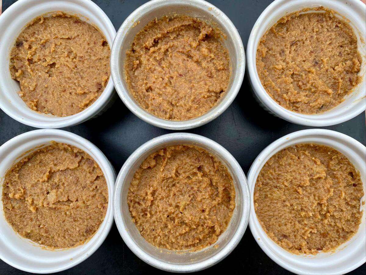 Uncooked mini sticky toffee puddings.