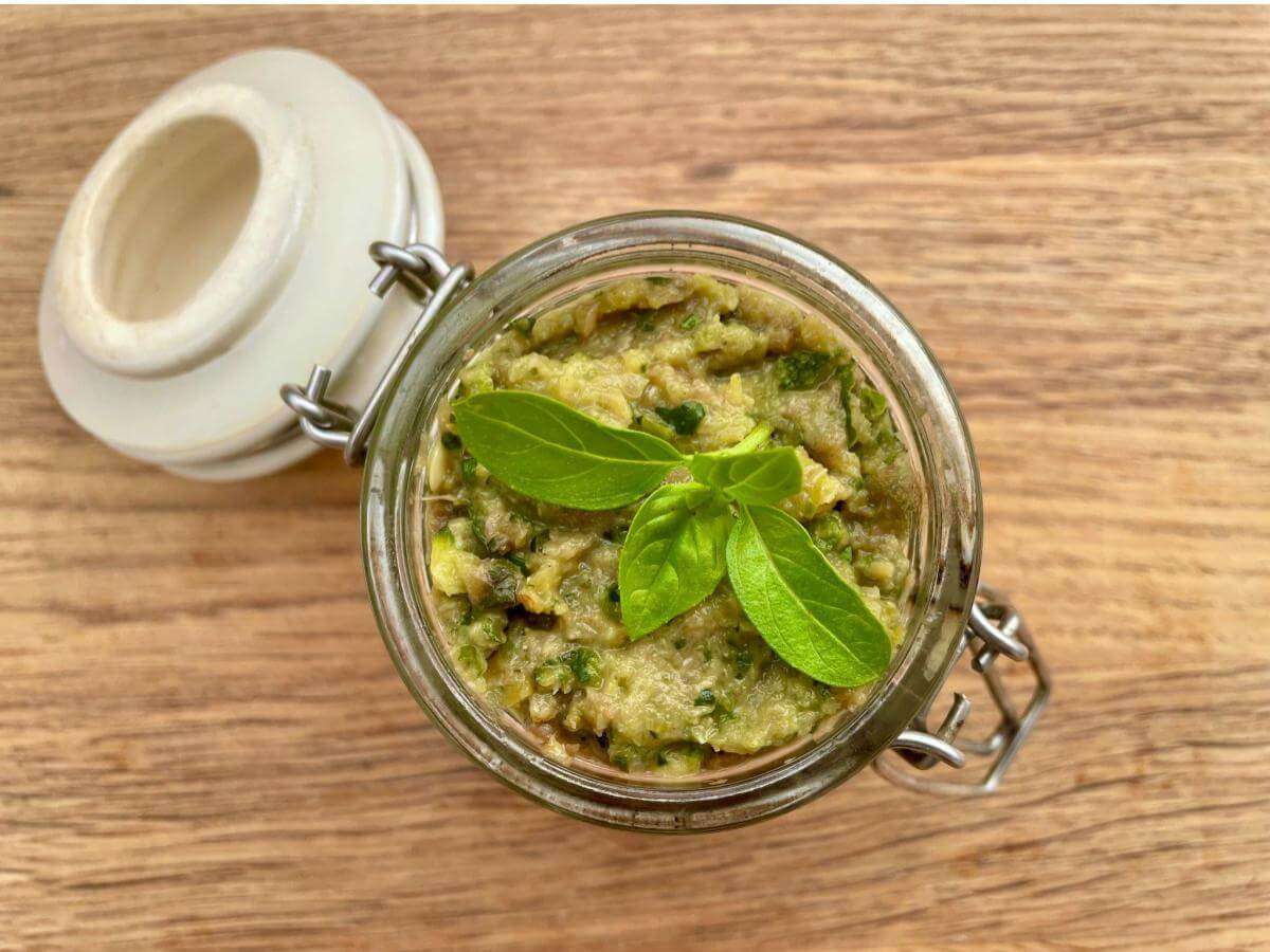 Courgette pesto in jar.