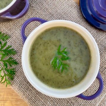 Carrot top soup in bowl.