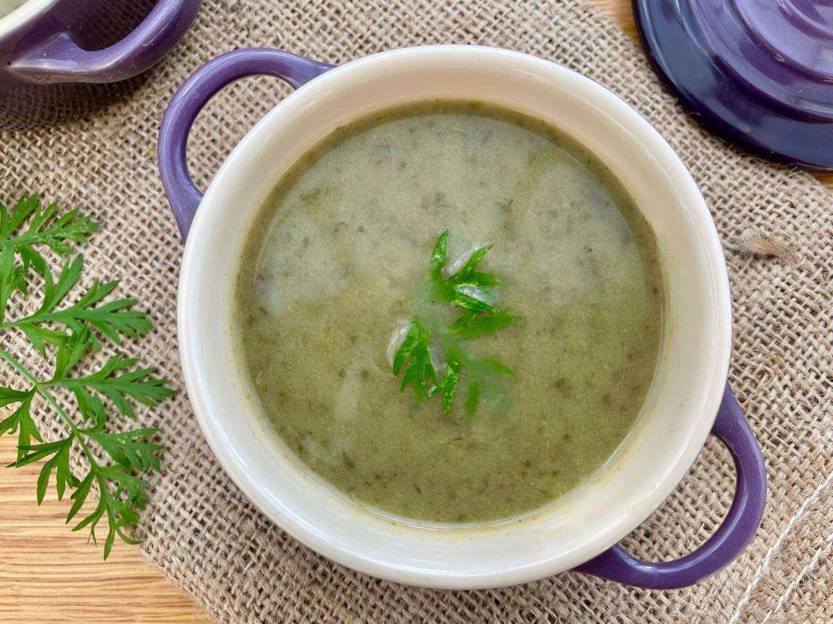 Carrot top soup in bowl.