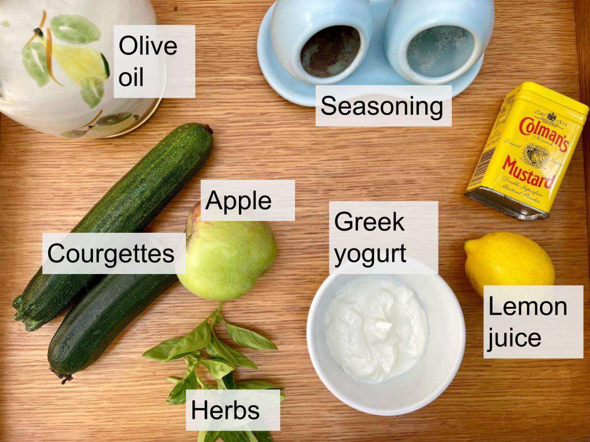 Courgettes, apple, herbs, Greek yogurt, olive oil, lemon juice, mustard, seasoning.