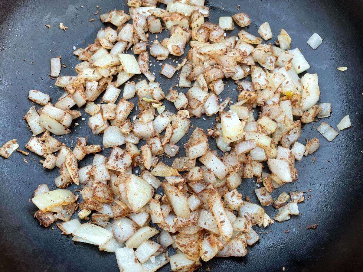 Browned onions in pan.