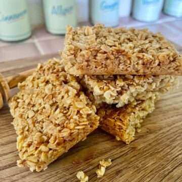Stack of healthy honey flapjacks with no refined sugar or golden syrup.